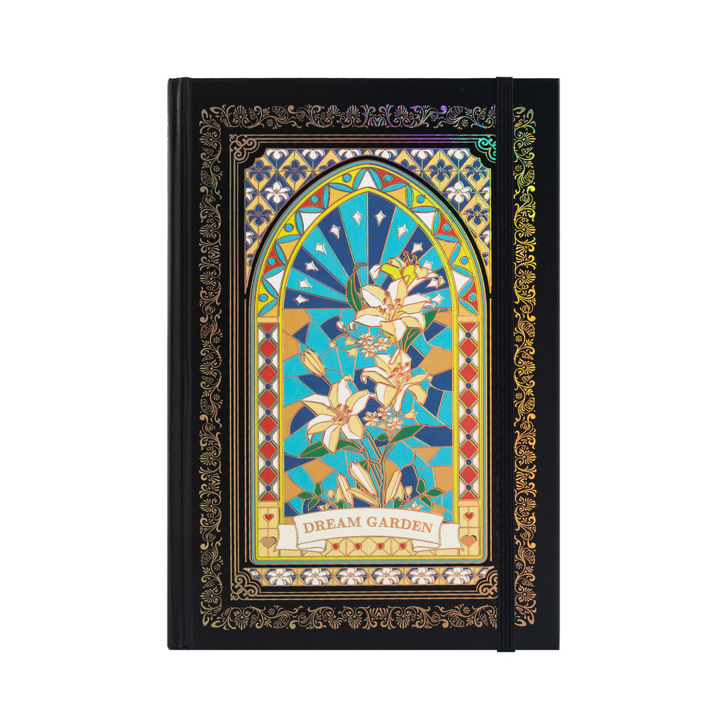 A5 black and blue holographic lily cardboard notebook with Dream Garden floral arch design, standing upright on a white background.