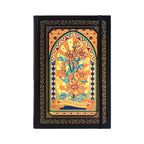 A5 black and gold holographic sunflower cardboard notebook with Dream Garden floral arch design, standing upright on a white background.