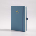 A5 Blue Vegan Leather Hummingbird Notebook, White Background Side View with Pen Loop
