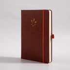 A5 Brown Vegan Leather Hummingbird Notebook, White Background Side View with Pen Loop