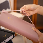 MGGAO A5 Couple Pink Vegan Leather Hummingbird Notebook, Pink Elastic Band Close-up with Hand