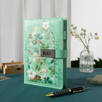 Green floral vegan leather journal with a metal password lock, standing upright on a dark green desk with a pen and dried flowers.