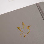 A5 Grey Vegan Leather Hummingbird Notebook Close-up, Gold Foil Hummingbird Emboss Detail