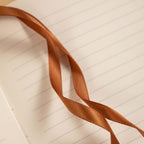 A5 Red Vegan Leather Hummingbird Notebook Detail, Brown Ribbon Bookmark on 7mm Ruled Lined Paper
