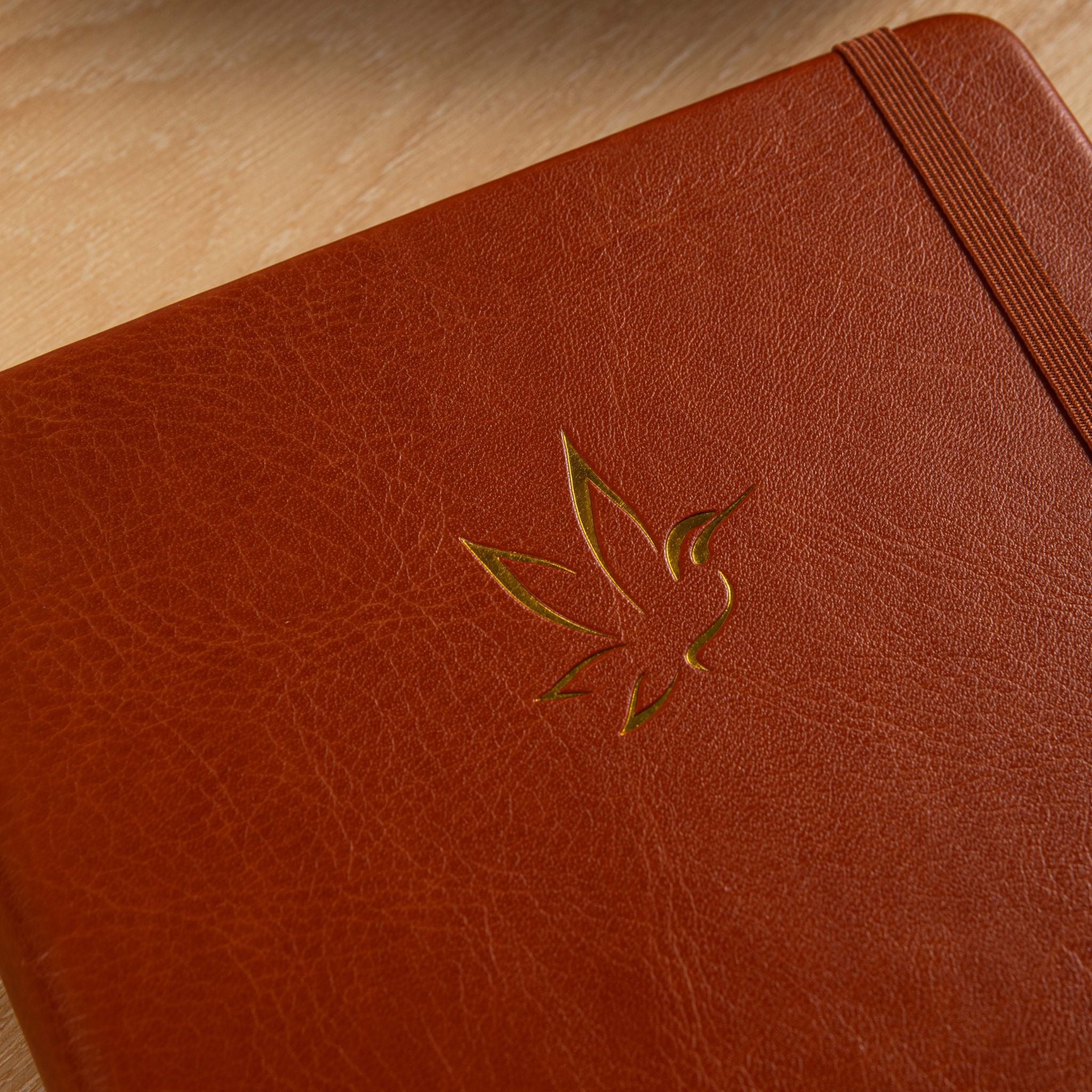 A5 Red Vegan Leather Hummingbird Notebook Close-up, Gold Foil Hummingbird Emboss with Fan
