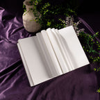 A5 Purple Taupe Floral Tapestry Hardcover Notebook Open, Fanned Pages Showing 100gsm Thick Paper on Purple Silk