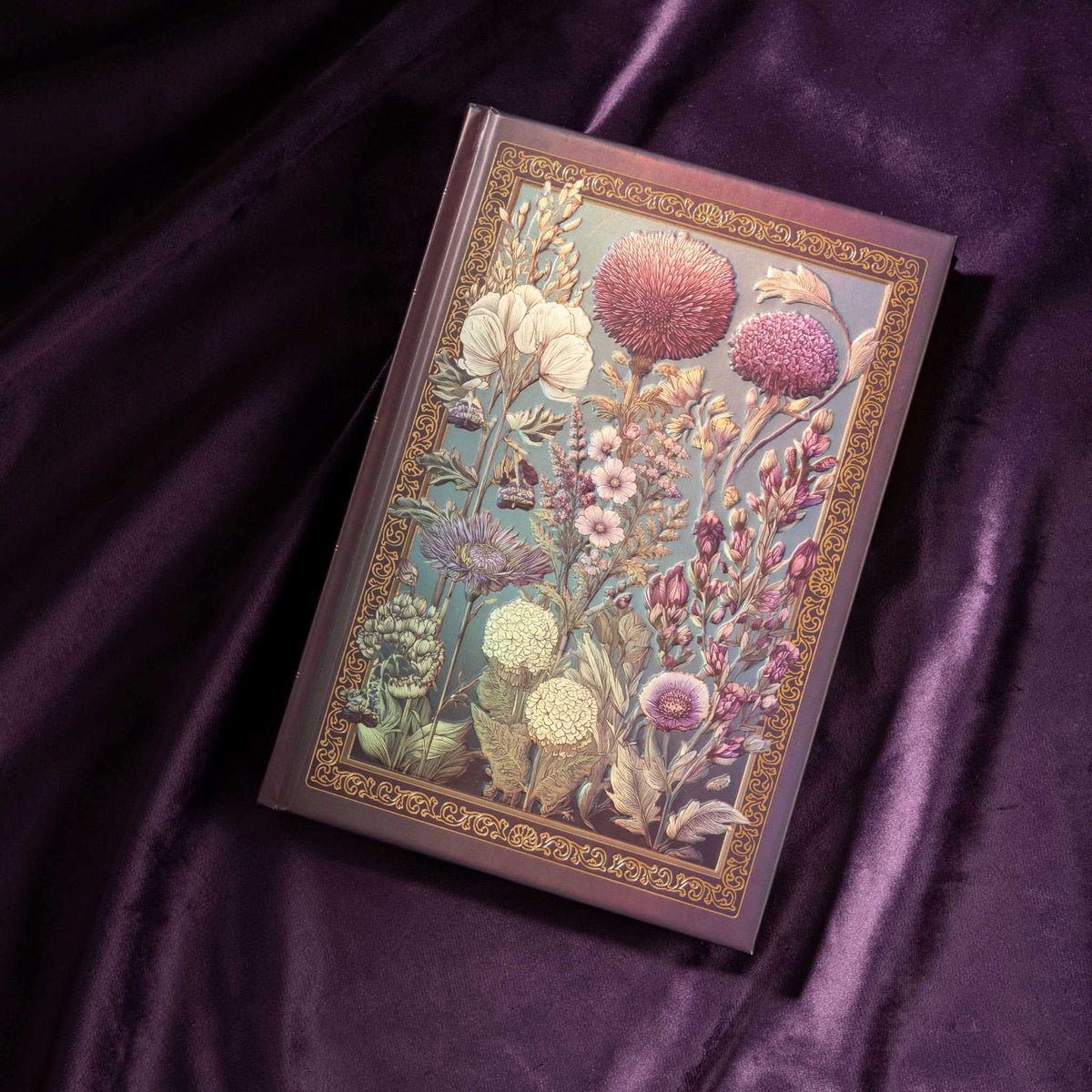 A5 Purple Taupe Floral Tapestry Hardcover Notebook Flat Lay on Purple Silk, Gold Border Detail