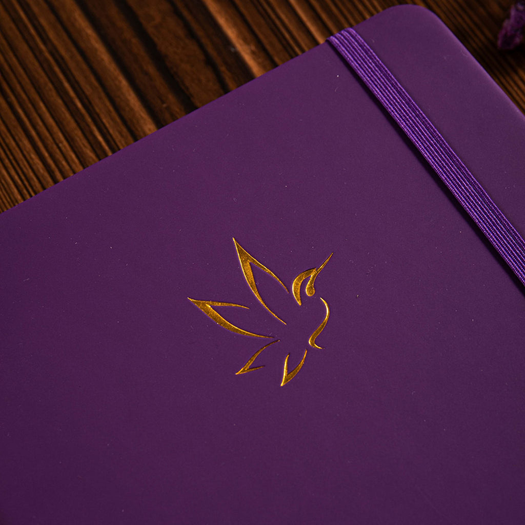 A5 Purple Vegan Leather Hummingbird Notebook Close-up, Gold Foil Hummingbird Emboss with Dried Flowers