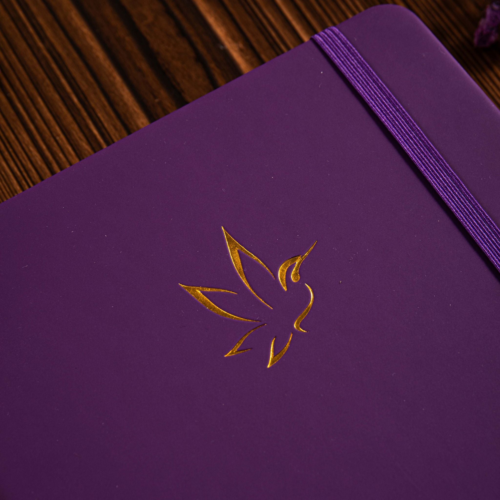 A5 Purple Vegan Leather Hummingbird Notebook Close-up, Gold Foil Hummingbird Emboss with Dried Flowers