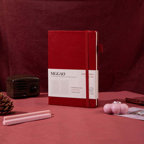 MGGAO A5 Red Vegan Leather Notebook on Desk, Hardcover Journal with Elastic Closure and Pen Loop