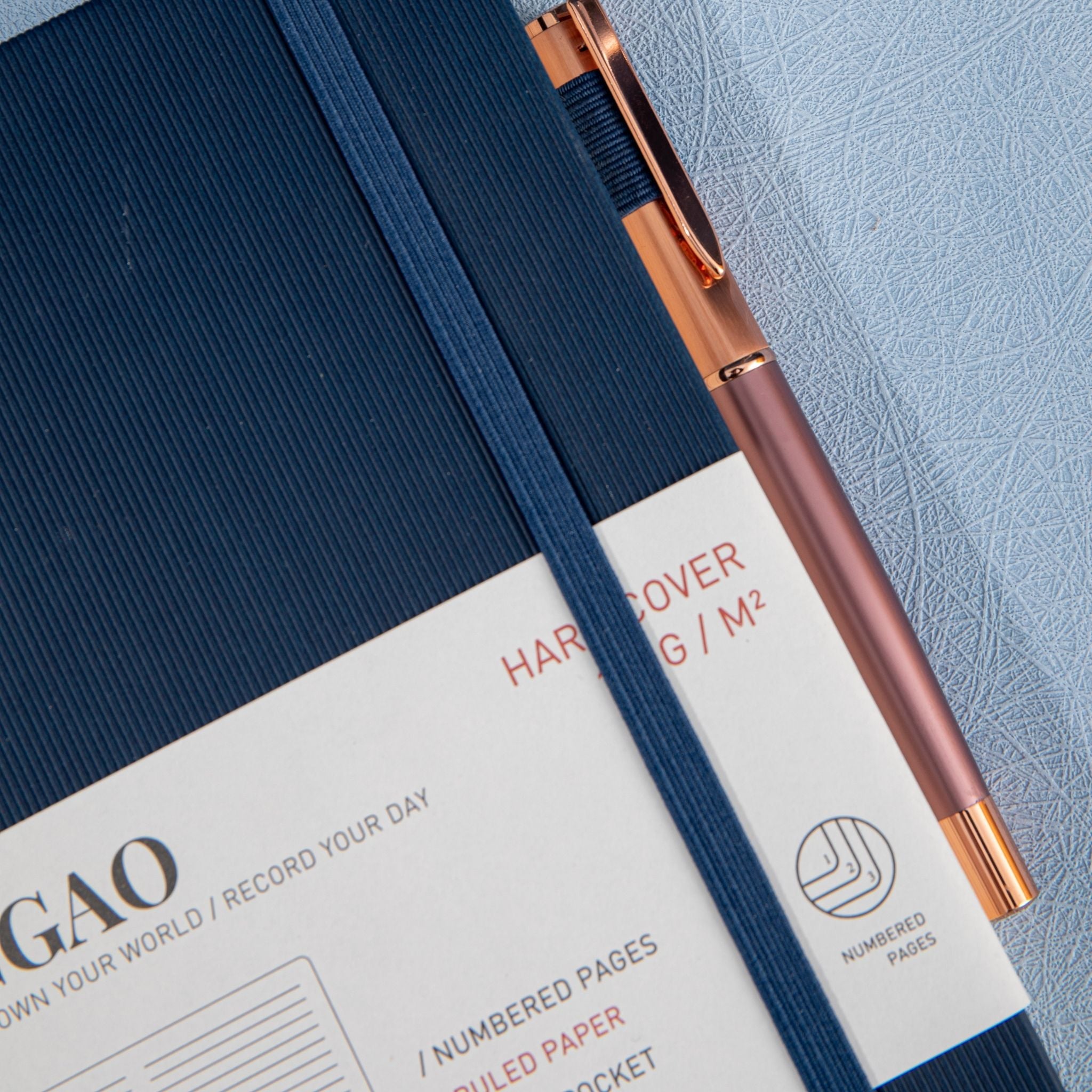 MGGAO A5 Striped Navy Vegan Leather Notebook Detail, Pen Loop and Elastic Band Close-up