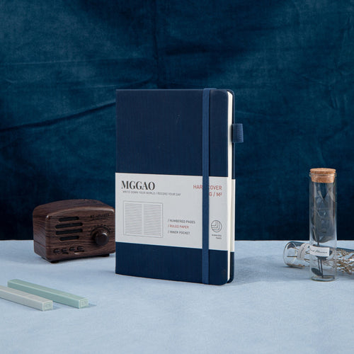 MGGAO A5 Striped Navy Vegan Leather Notebook on Desk, Hardcover Journal with Elastic Closure and Pen