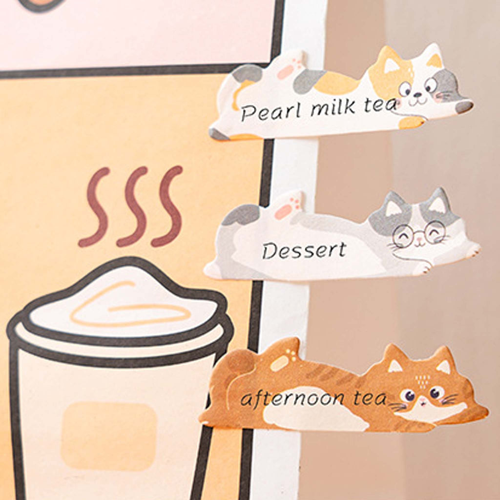 Three cute cartoon cat-shaped sticky notes or labels on a beige background, labeled 'Pearl milk tea', 'Dessert', and 'afternoon tea', with a coffee cup illustration on the left.