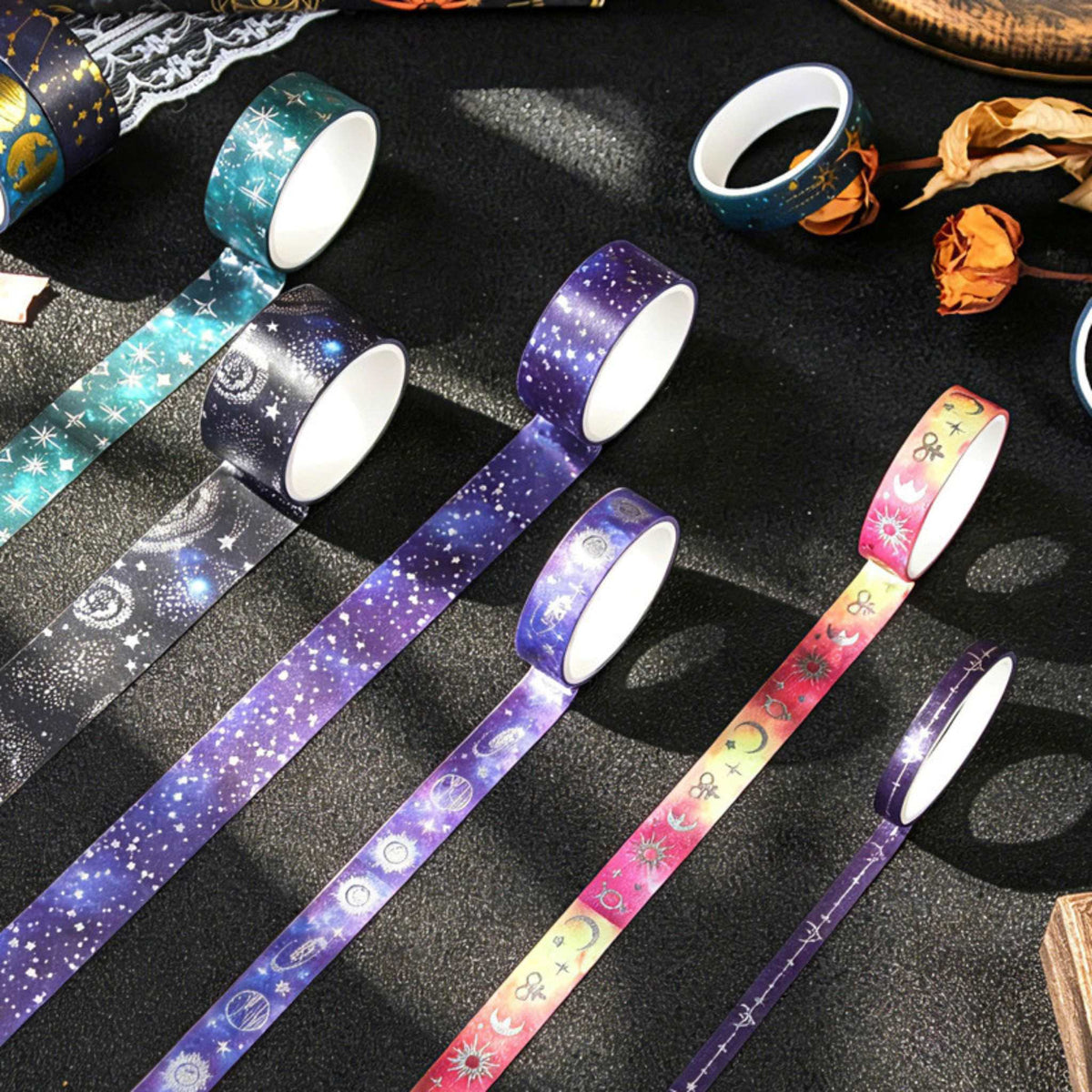 Celestial Dream Foil Washi Tape Set 19 Rolls, Assorted Rolls Spread Out Showing Holographic Foil and Mixed Widths