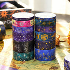Celestial Dream Foil Washi Tape Set 19 Rolls, Stacked Rolls Showing Starry Sky and Planet Patterns