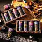 Celestial Dream Foil Washi Tape Set 19 Rolls, Gift Boxes and Loose Rolls on Dark Wooden Desk with Vintage Decor