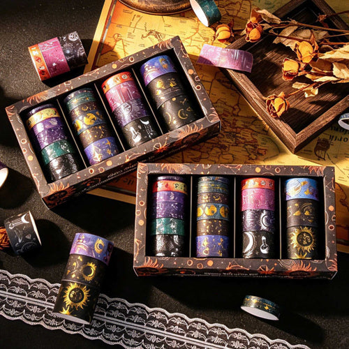 Celestial Dream Foil Washi Tape Set 19 Rolls, Gift Boxes and Loose Rolls on Dark Wooden Desk with Vintage Decor