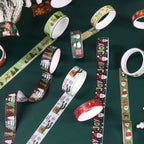 Christmas Gold Foil Washi Tape Set 12 Rolls, Unrolled Tapes Spread on Dark Green Table Showing Festive Patterns