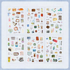 Six sheets of Colored Universe watercolor PET stickers displayed on a light gray-blue background, featuring hand-drawn illustrations of everyday home items, stationery, coffee cups, potted plants, and vintage objects.