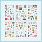 Six sheets of Journey Wonders watercolor PET stickers displayed on a light blue background, featuring hand-drawn illustrations of travel landmarks like London buses, the Eiffel Tower, scooters, suitcases, cameras, and vintage travel accessories.
