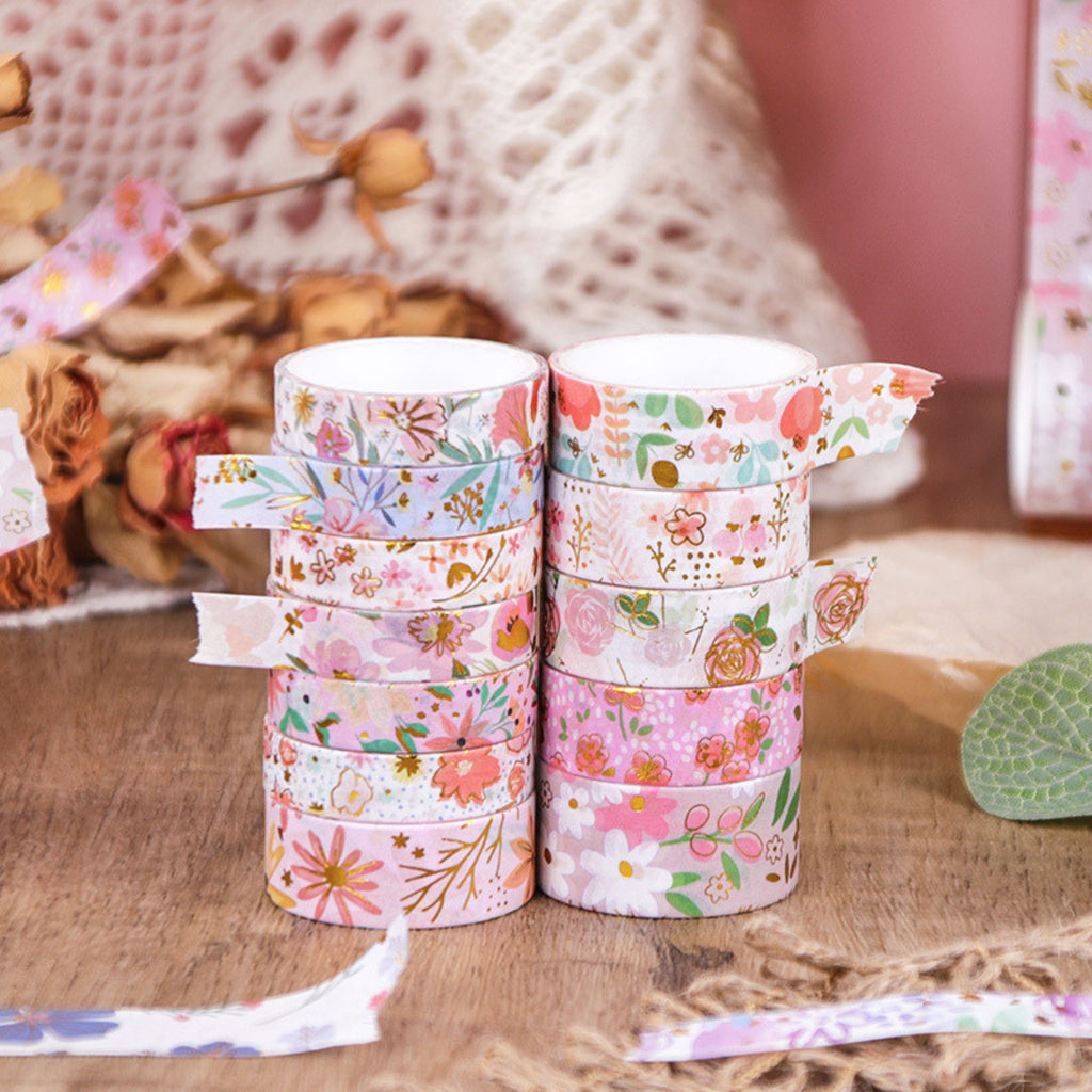 Floral Dream Gold Foil Washi Tape Set 12 Rolls, Pink Floral Rolls Close-up on Wooden Desk
