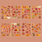 The Song of Dusk theme from the Forest Song gold foil PET sticker collection, displayed in its hang-hole OPP packaging with warm autumn tones, pinecones, and a rustic background.