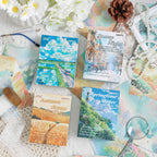 Stack of decorative scrapbook paper sheets