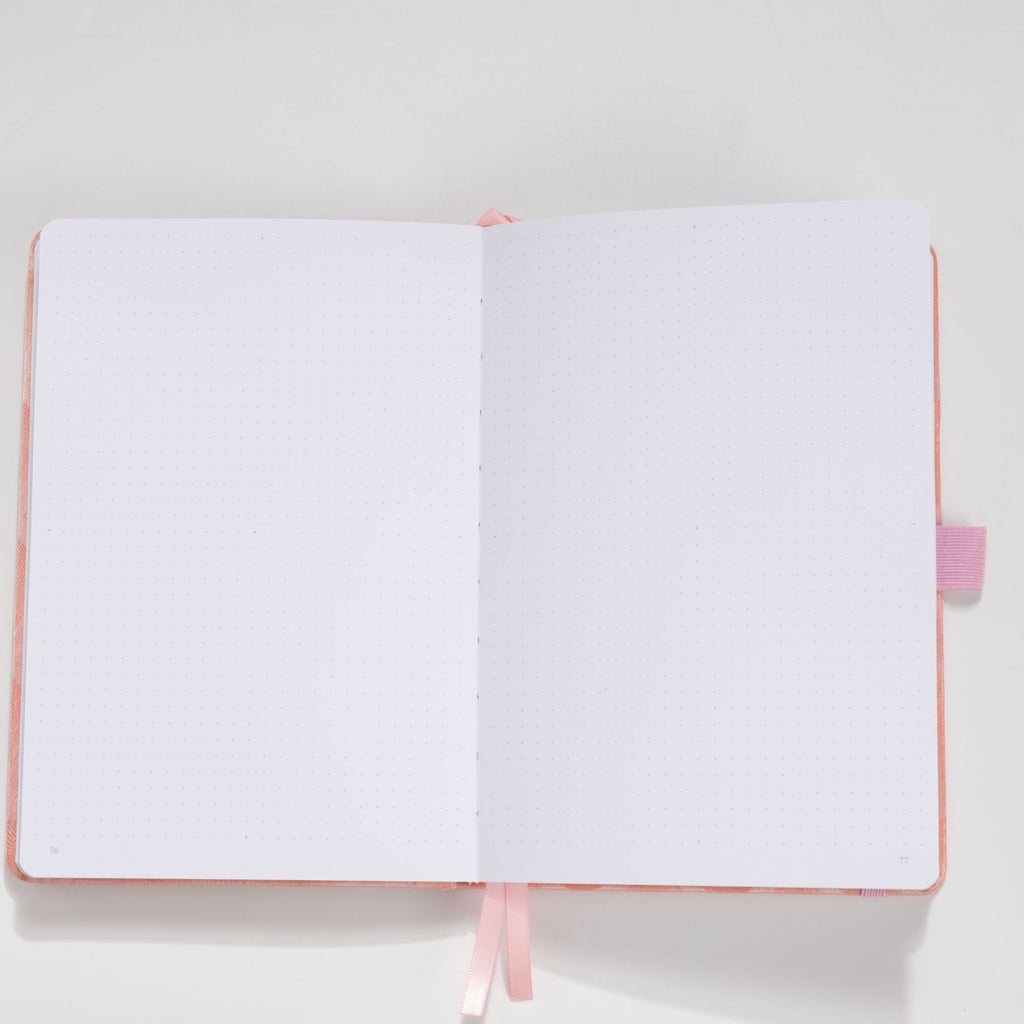 Interior pages of pink scalloped notebook – dot grid 160gsm and lined 100gsm options