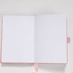 Interior pages of pink scalloped notebook – dot grid 160gsm and lined 100gsm options