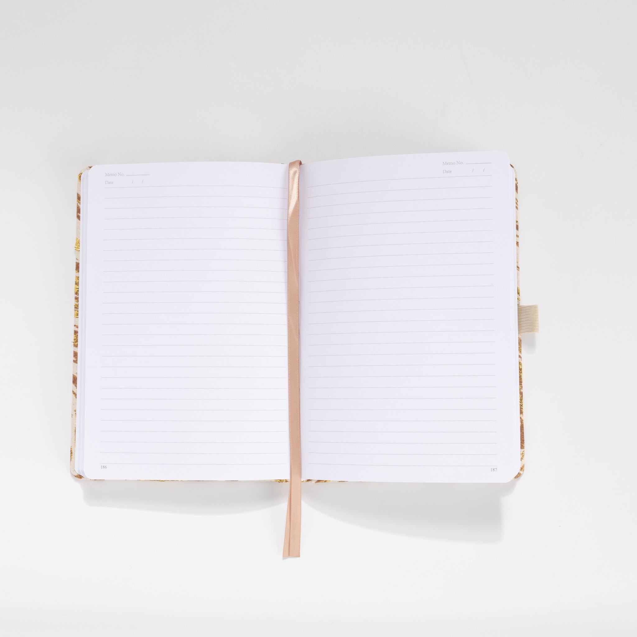 100gsm lined pages with month and date header in gold marble notebook