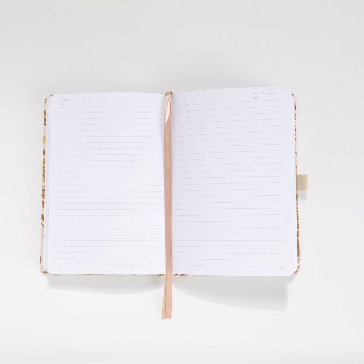 100gsm lined pages with month and date header in gold marble notebook