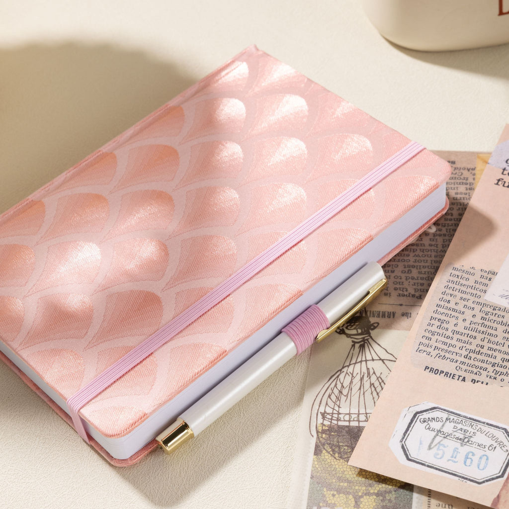 A5 pink scalloped fabric notebook styled on desk – lifestyle shot