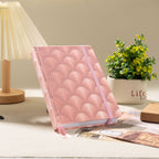A5 pink scalloped fabric notebook styled on desk – lifestyle shot