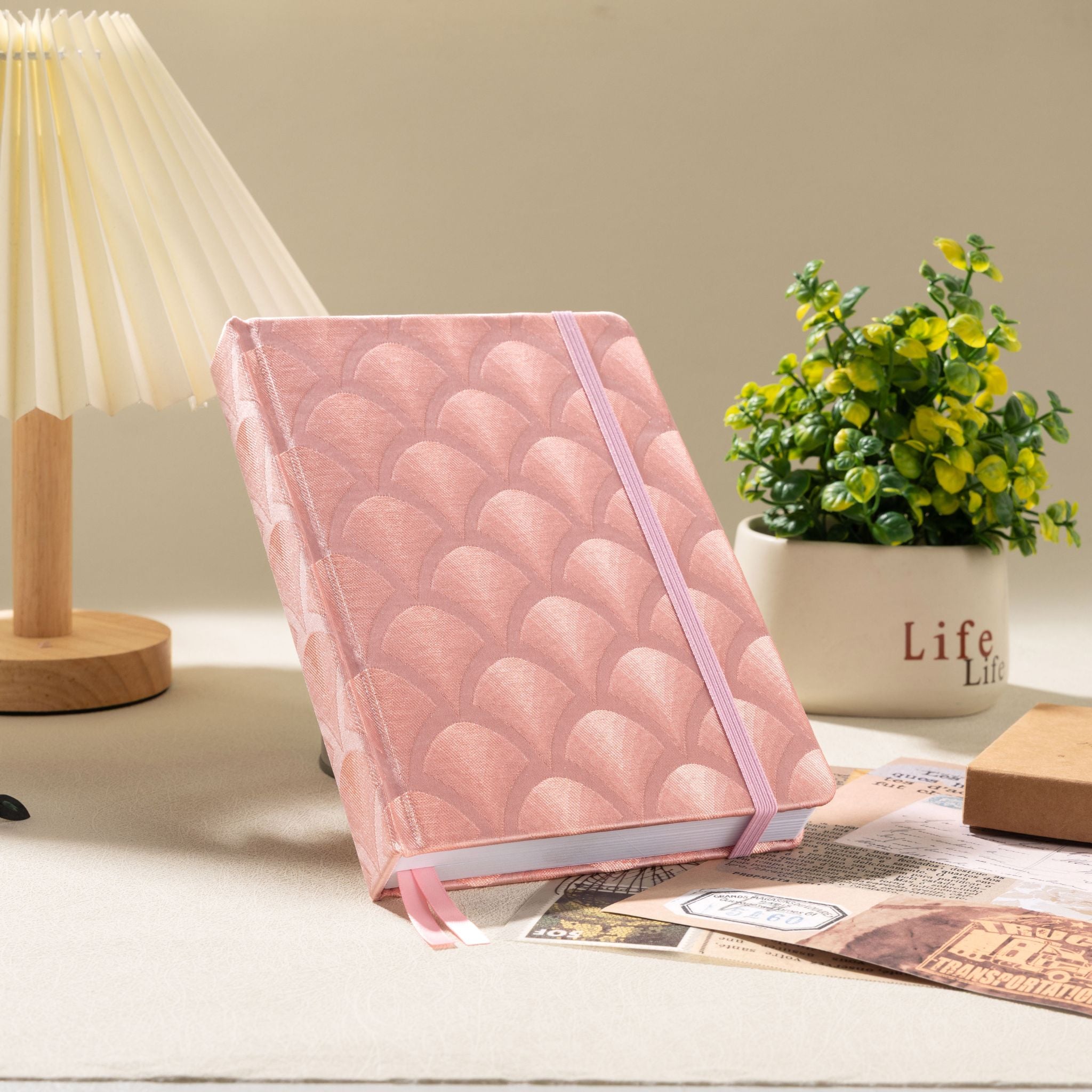 A5 pink scalloped fabric notebook styled on desk – lifestyle shot