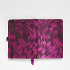 Flat lay of the purple and black metallic woven fabric cover opened completely