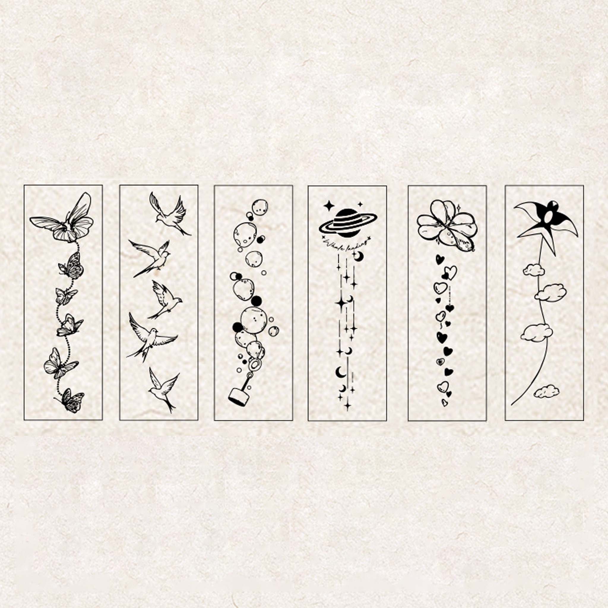 A flat-lay of 6 stamped line-art designs from the Wind-Kissed Poems set, each featuring a vertical layout of butterflies, flying birds, bubble trails, stars and moons, flowers with hearts, and clouds with a windmill, displayed on a textured background.